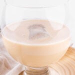 Side photo of a glass of vegan Baileys