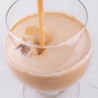 Square photo of a glass of vegan Baileys