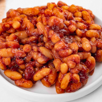 Square photo of a plate of vegan baked beans