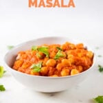 Side photo of a bowl of vegan chana masala with a title