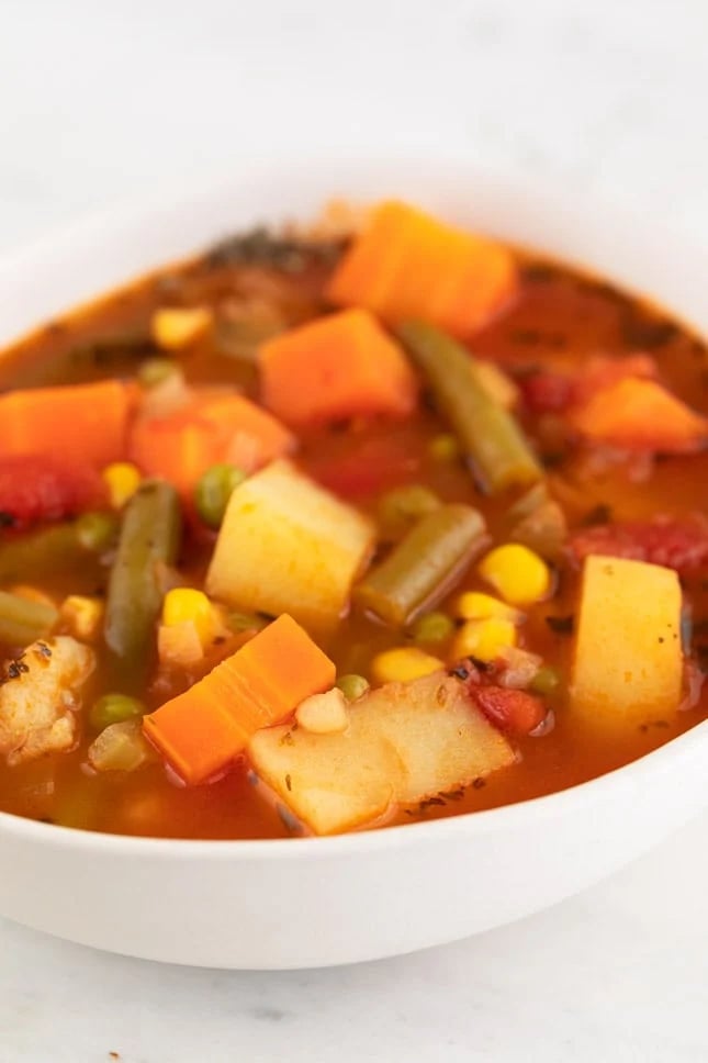 Close-up photo of a bowl of vegan vegetable soup