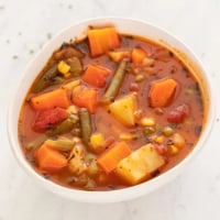 Square photo of a bowl of vegan vegetable soup