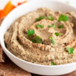 Close-up photo of a bowl of baba ganoush with a heading
