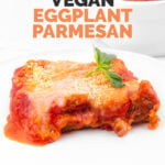 Photo of some vegan eggplant Parmesan with a heading
