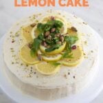 Photo of a vegan lemon cake on a cake stand with a heading