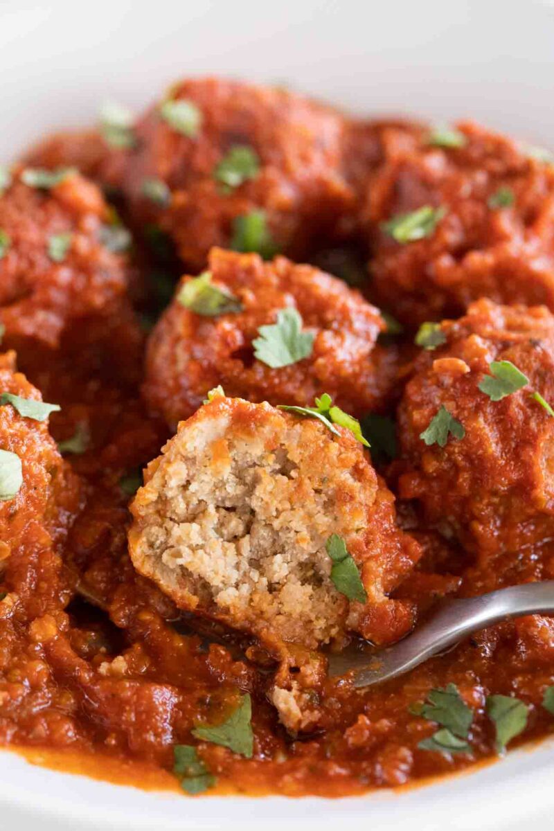 A close-up photo of the inside of a vegan meatball