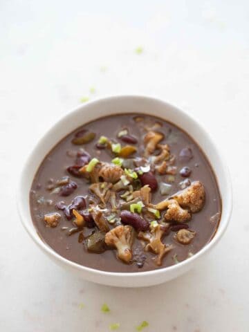 Photo of a white bowl with vegan gumbo