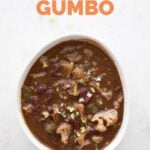 Photo from above of a bowl with vegan gumbo with a heading