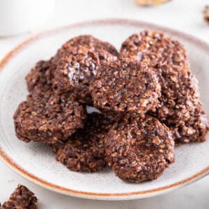 Square photo of a dish with vegan no bake cookies