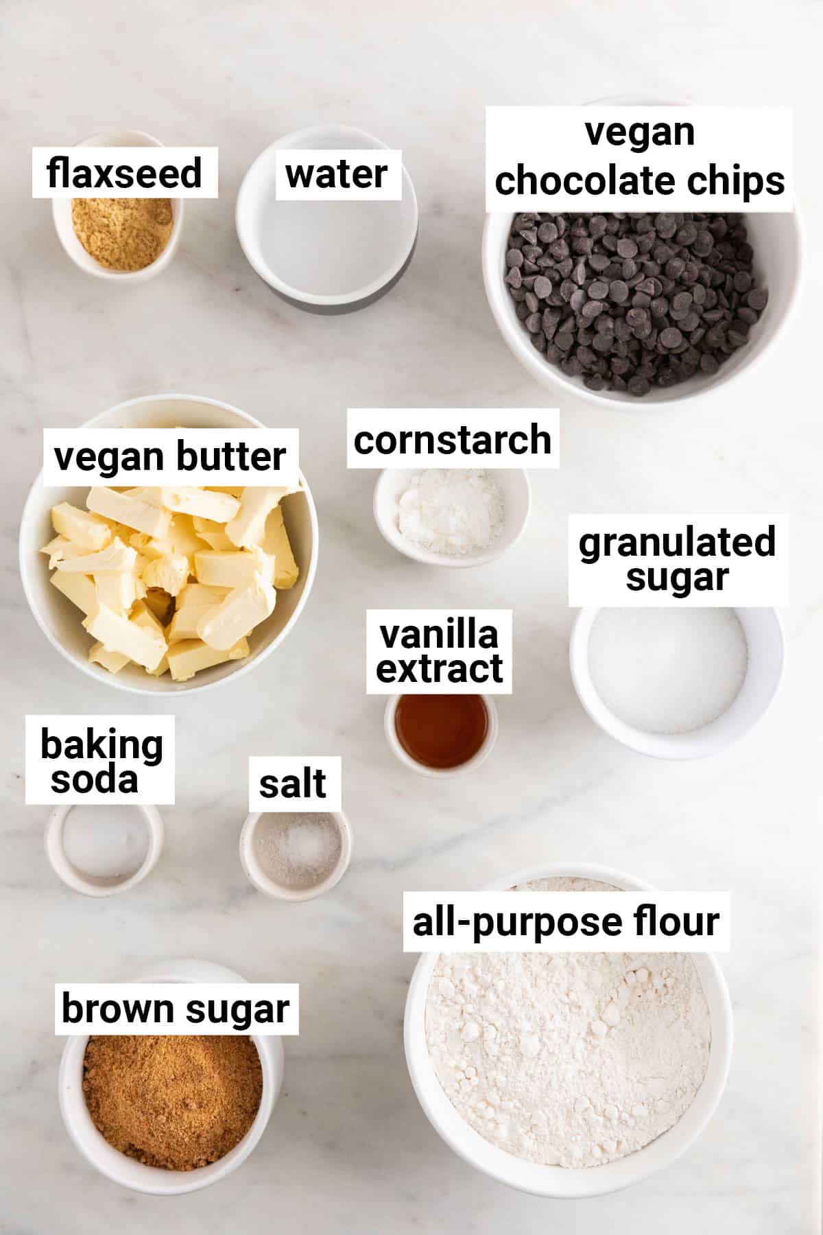 Ingredients needed to make vegan chocolate chip cookies.