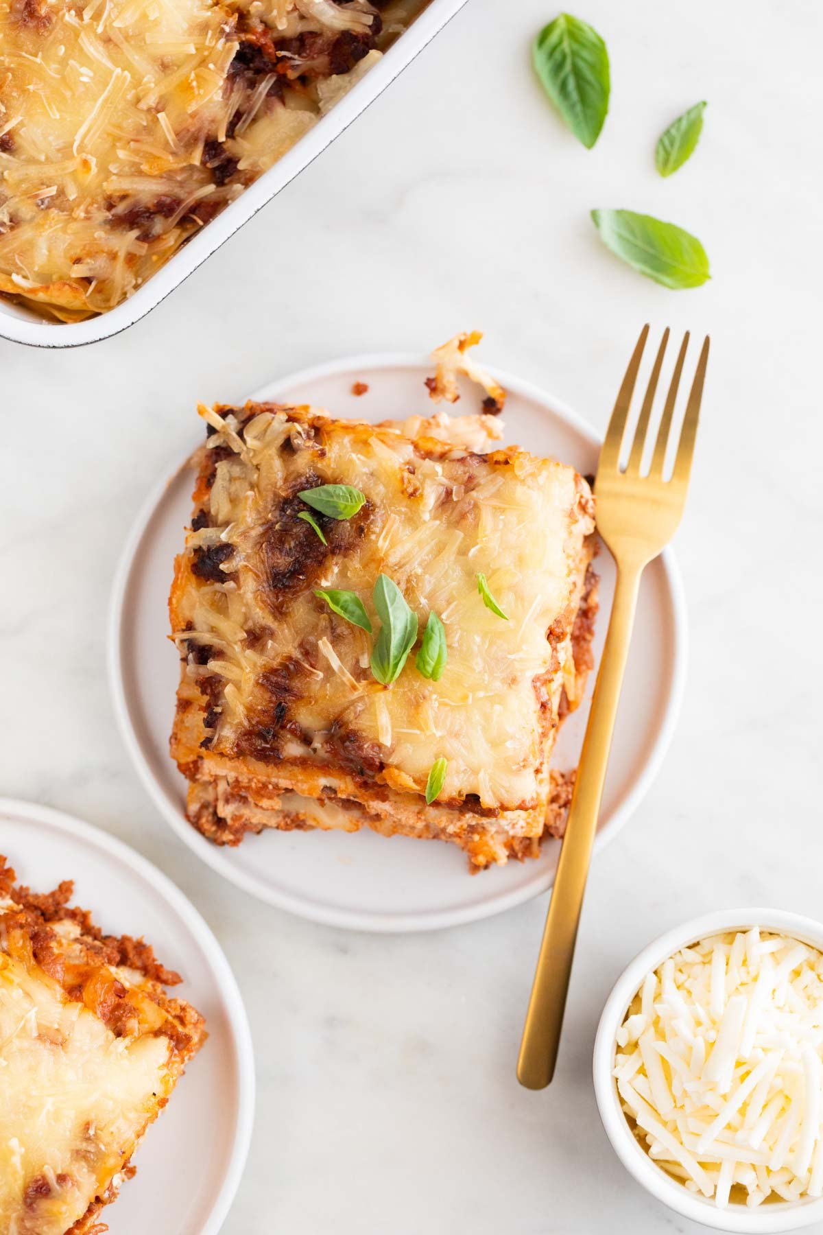 Overview of two dishes with a serving of vegan mozzarella.