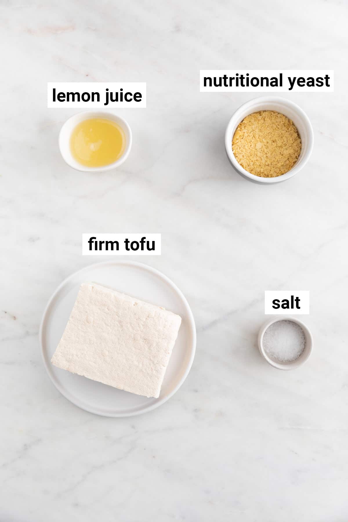 Ingredients needed to make vegan tofu ricotta cheese.