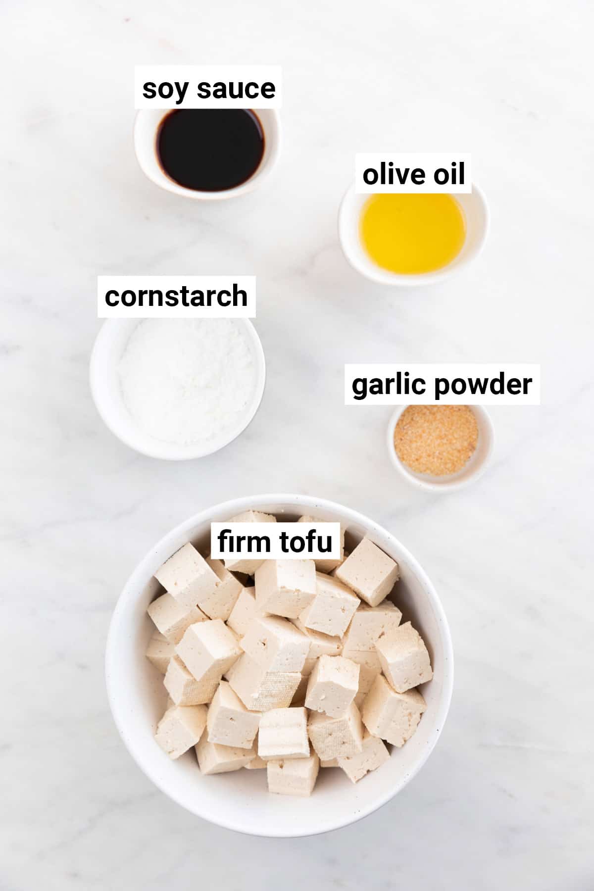 Ingredients needed to make crispy baked tofu.
