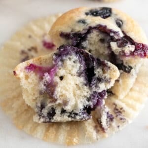 Sliced vegan blueberry muffin with a delightful, fruity center on display.