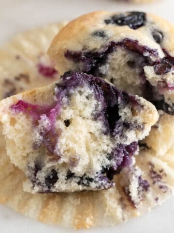 Sliced vegan blueberry muffin with a delightful, fruity center on display.