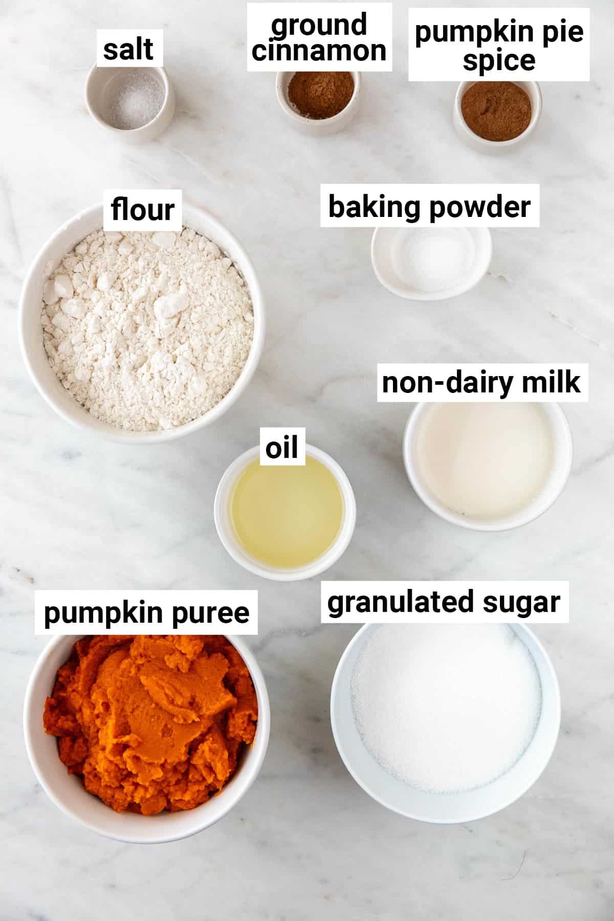 Ingredients needed to make vegan pumpkin muffins.