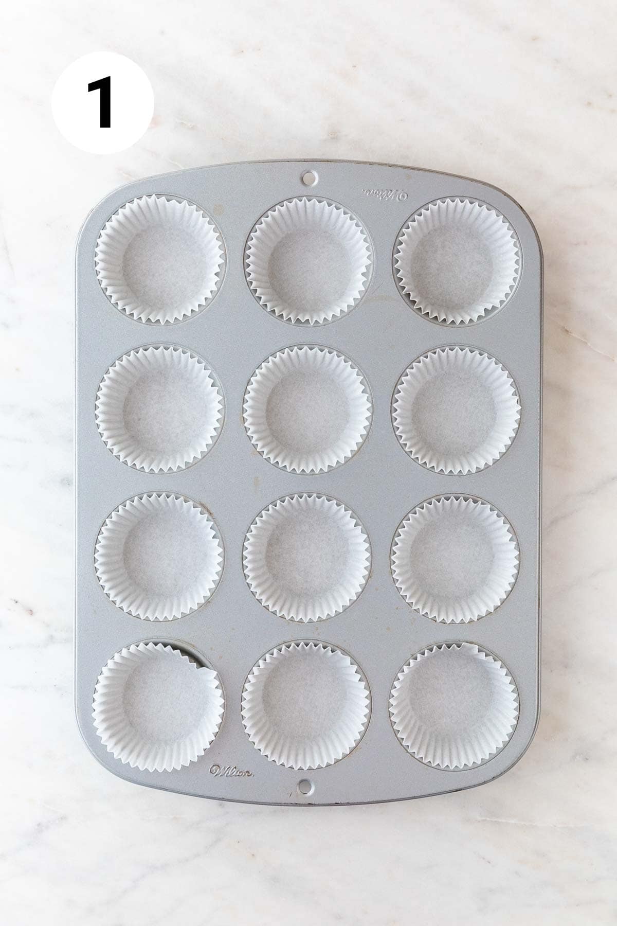 Muffin pan with liners.