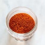 Handcrafted chili powder in a small jar.
