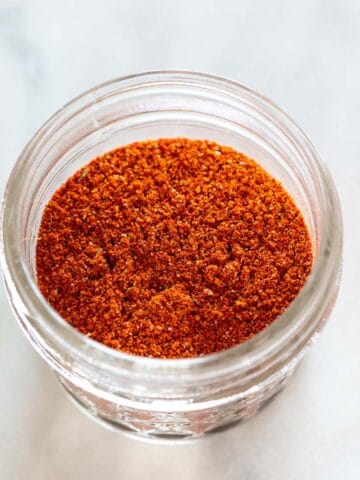 Handcrafted chili powder in a small jar.