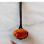 Teaspoon filled with homemade chili powder.