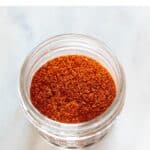 Small container holding homemade chili powder.