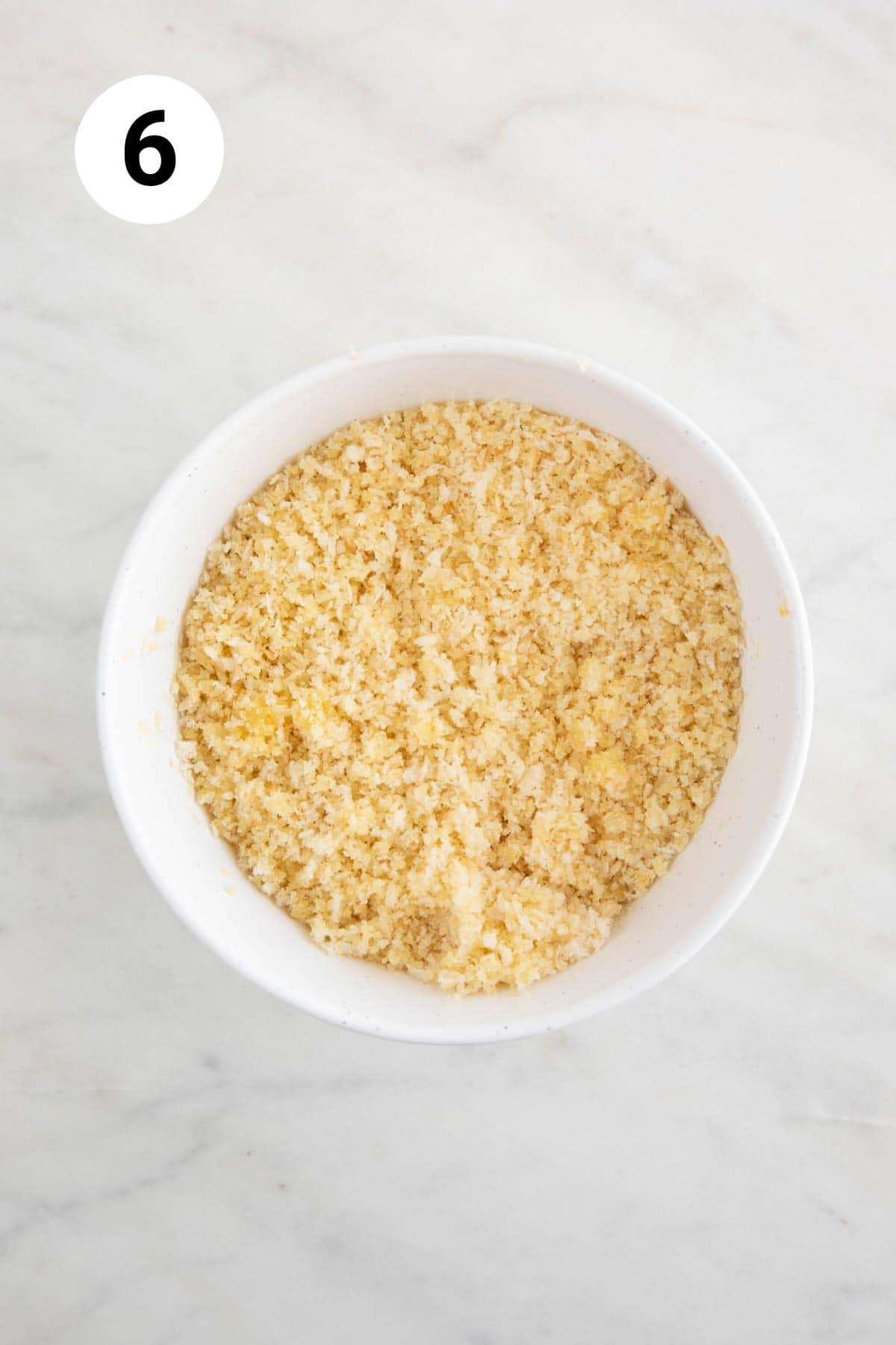 Bowl with panko breadcrumbs and melted vegan butter mixed until well combined.