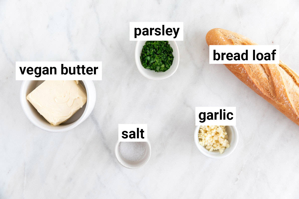 Ingredients needed to make vegan garlic bread.