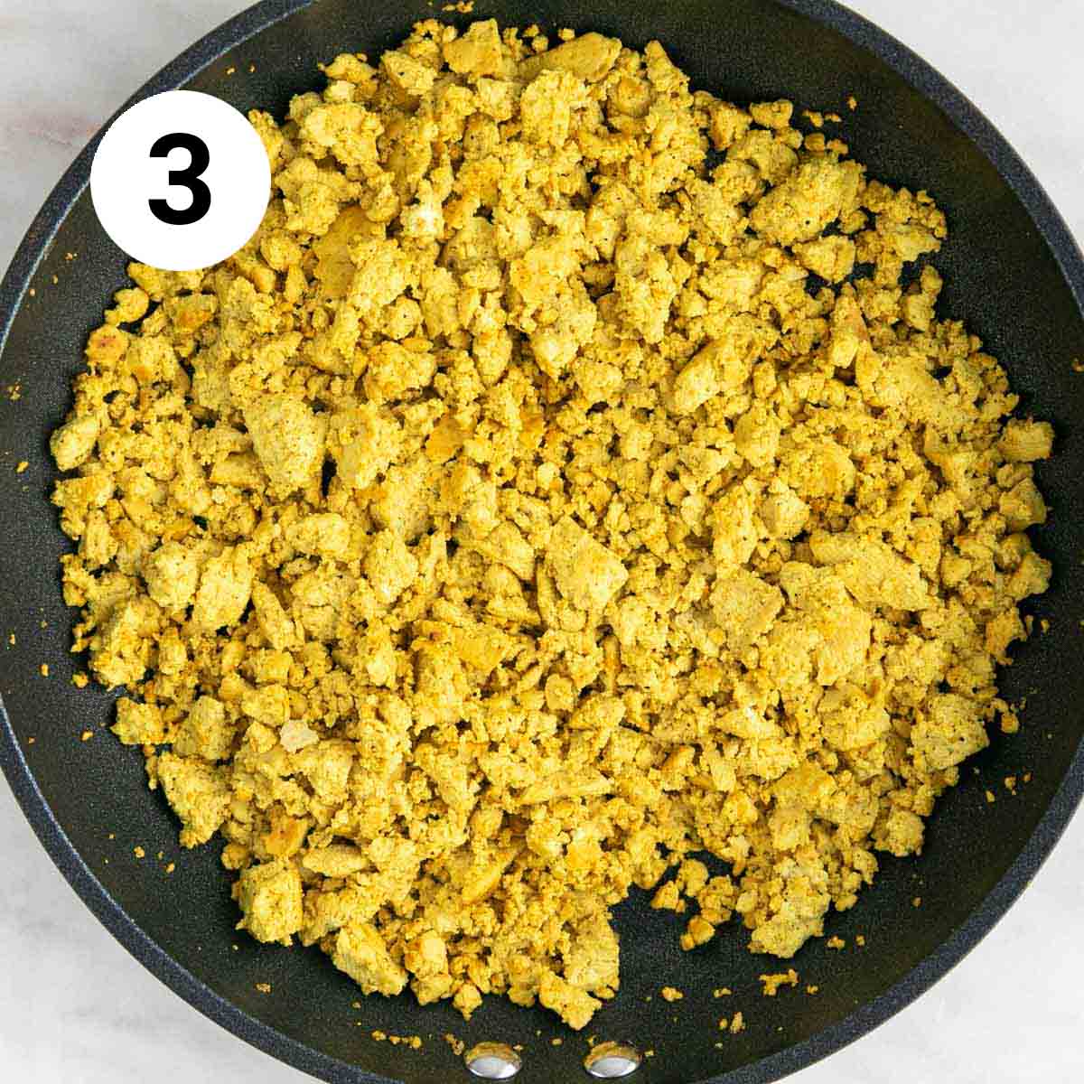 Tofu scramble in a pan after cooking.