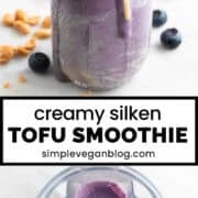 Silken tofu smoothie in a jar, topped with blueberries, peanut butter, and chopped peanuts.