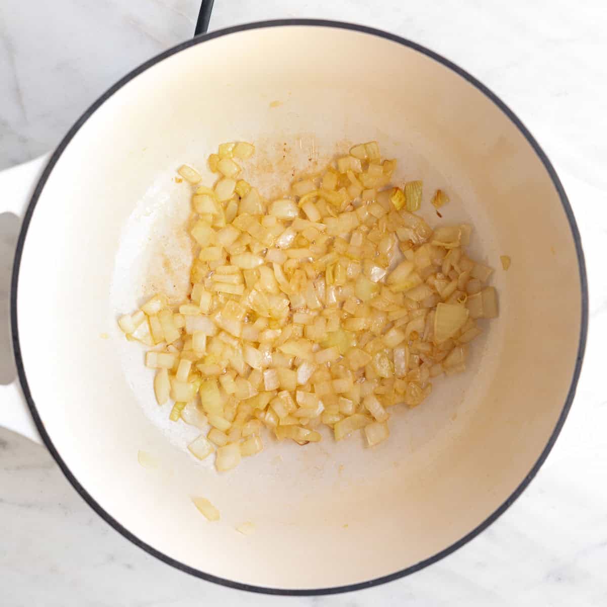 Sautéed onion in a large pot.