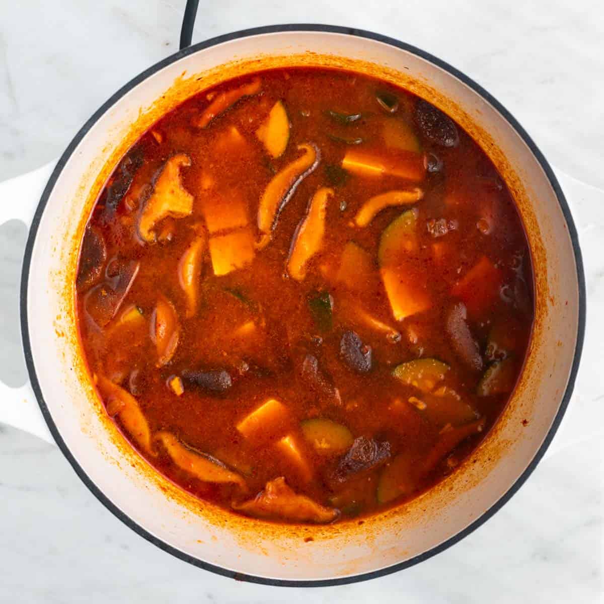 Cooked soup after adding the tofu.