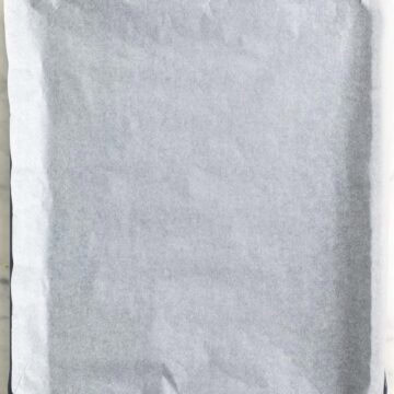 Lined baking sheet.