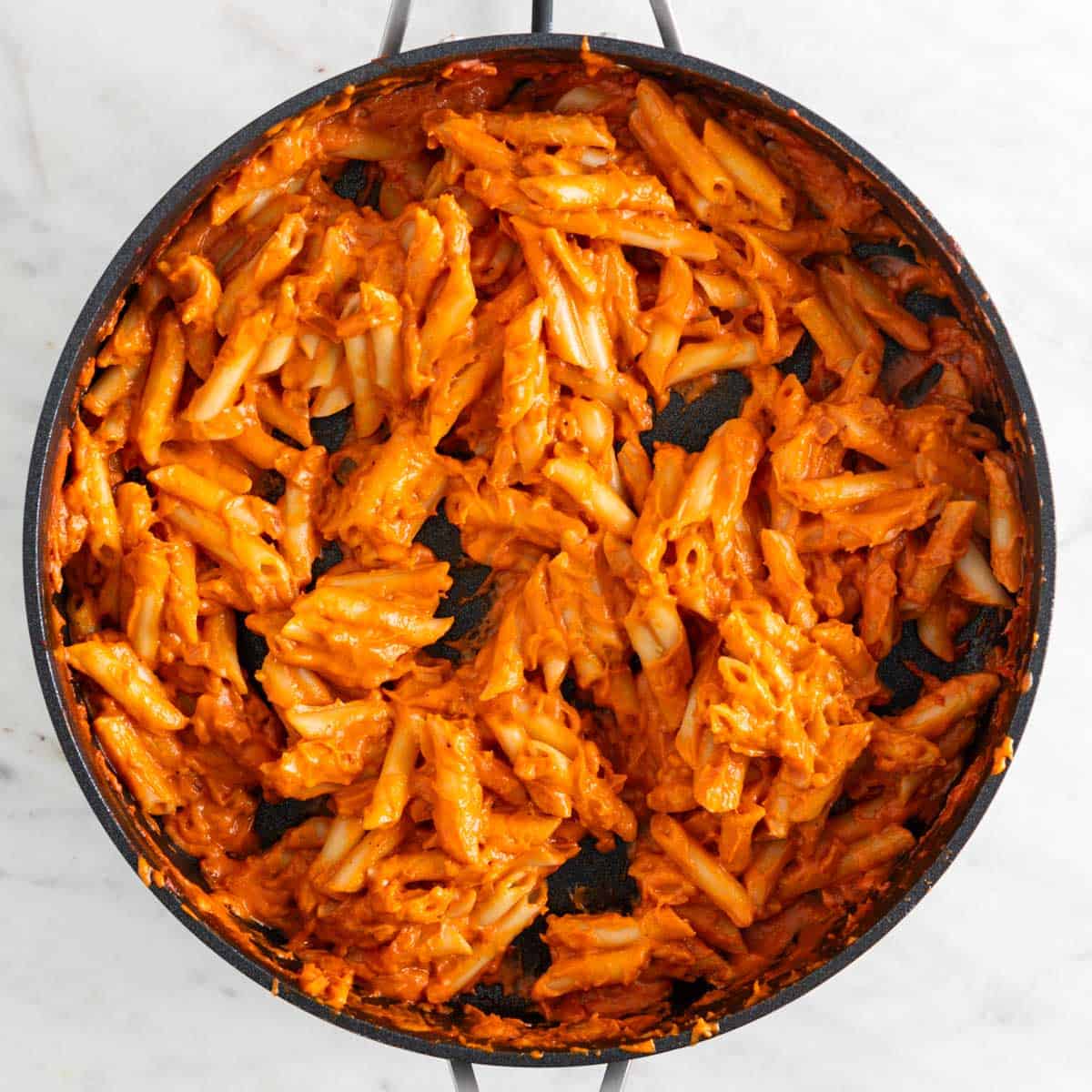 Vegan penne alla vodka in a skillet.