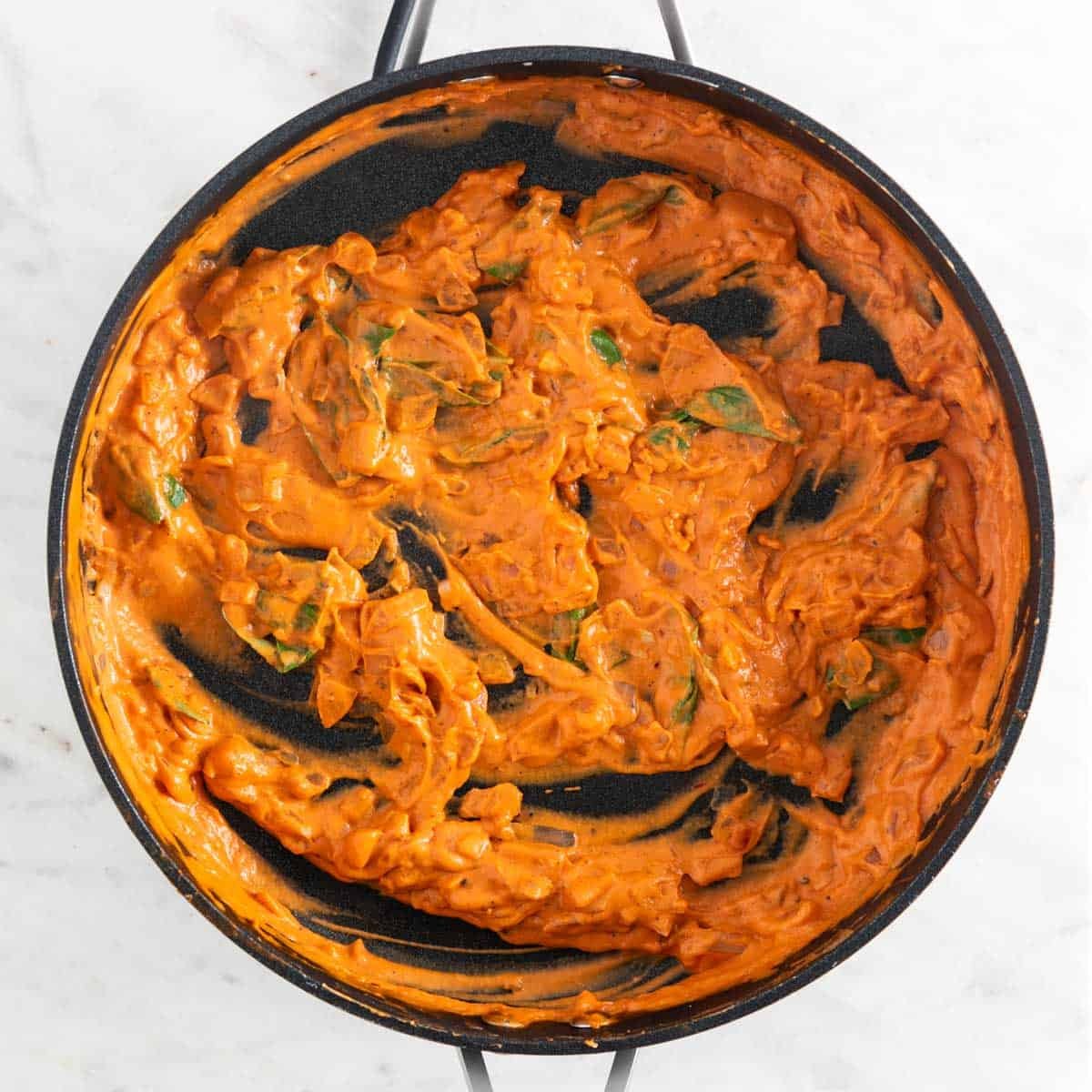 Vegan pasta sauce in a skillet.