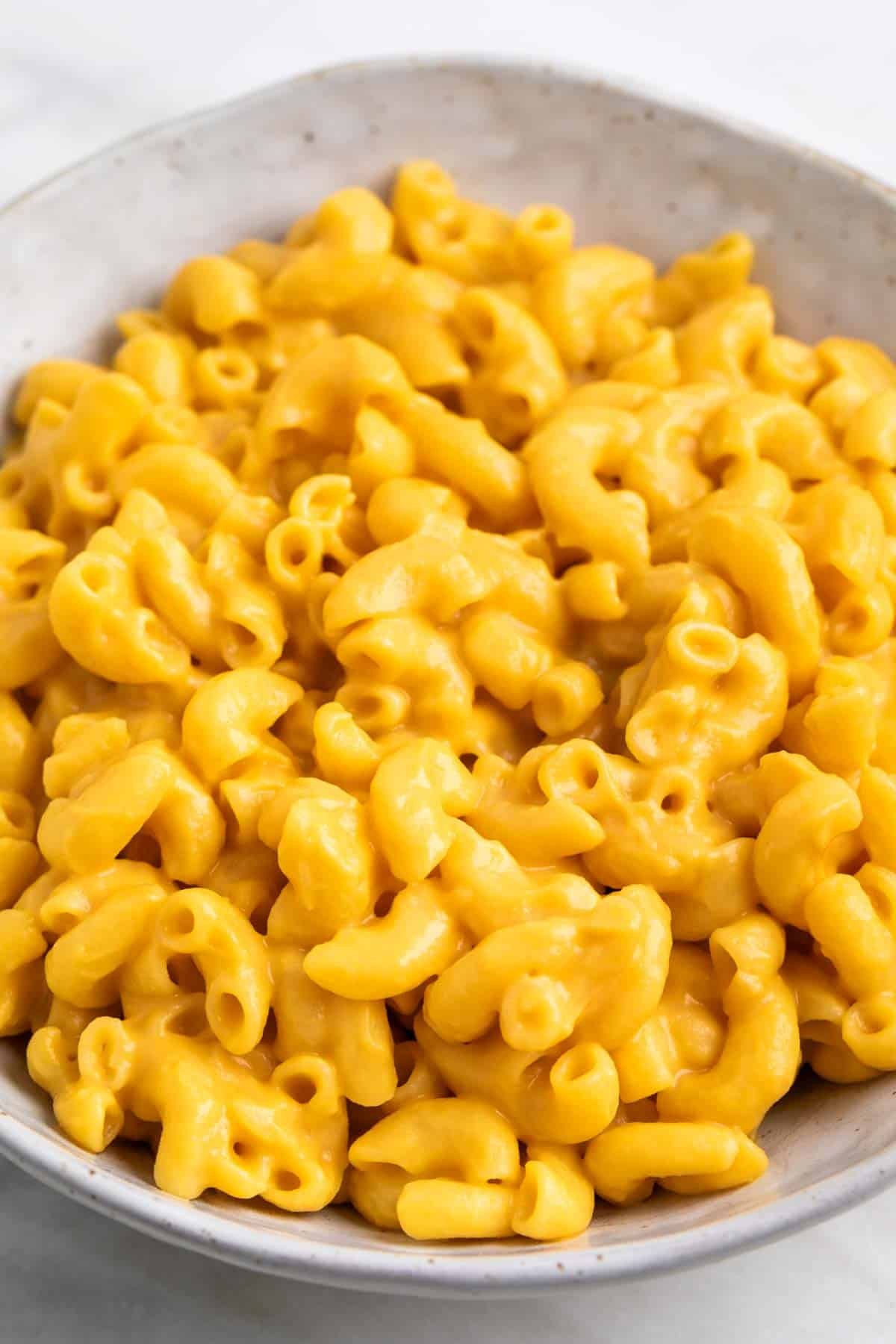 Vegan butternut squash mac and cheese served in a bowl.