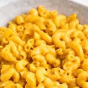 Vegan butternut squash mac and cheese in a serving bowl.