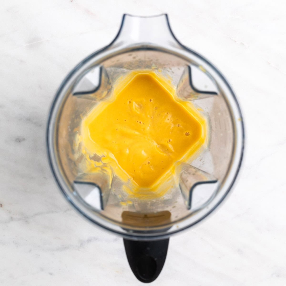 Blended butternut squash sauce in a blender jar.