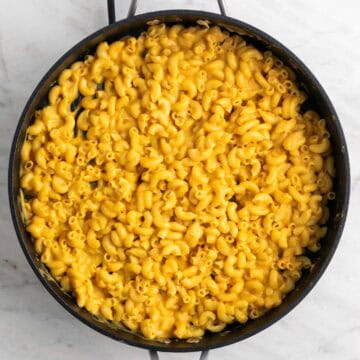 Vegan butternut squash mac and cheese in a skillet.