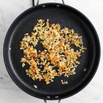 Caramelized onions in a skillet.