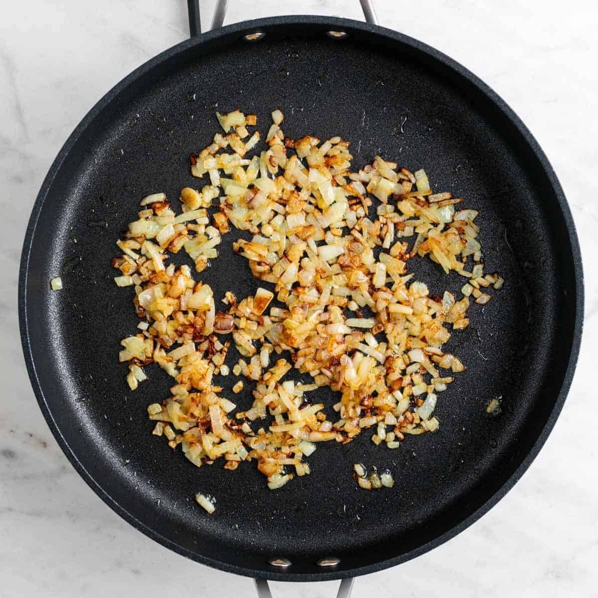 Caramelized onions in a skillet.