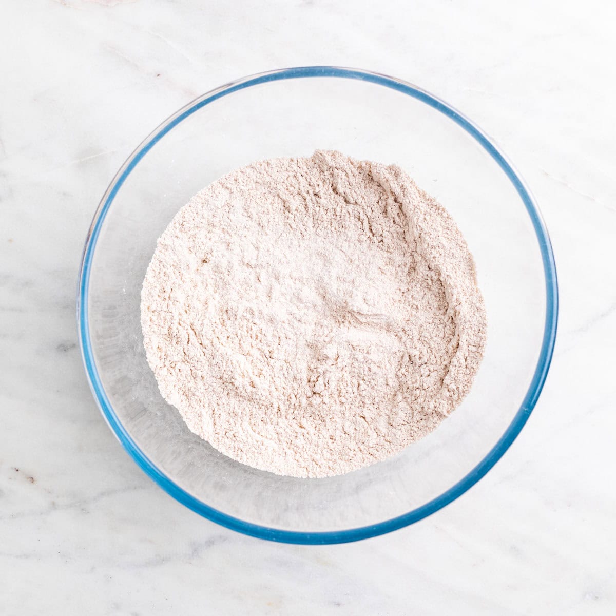 Dry ingredients mixed in a bowl.