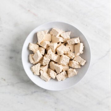 Bowl of tofu chunks.