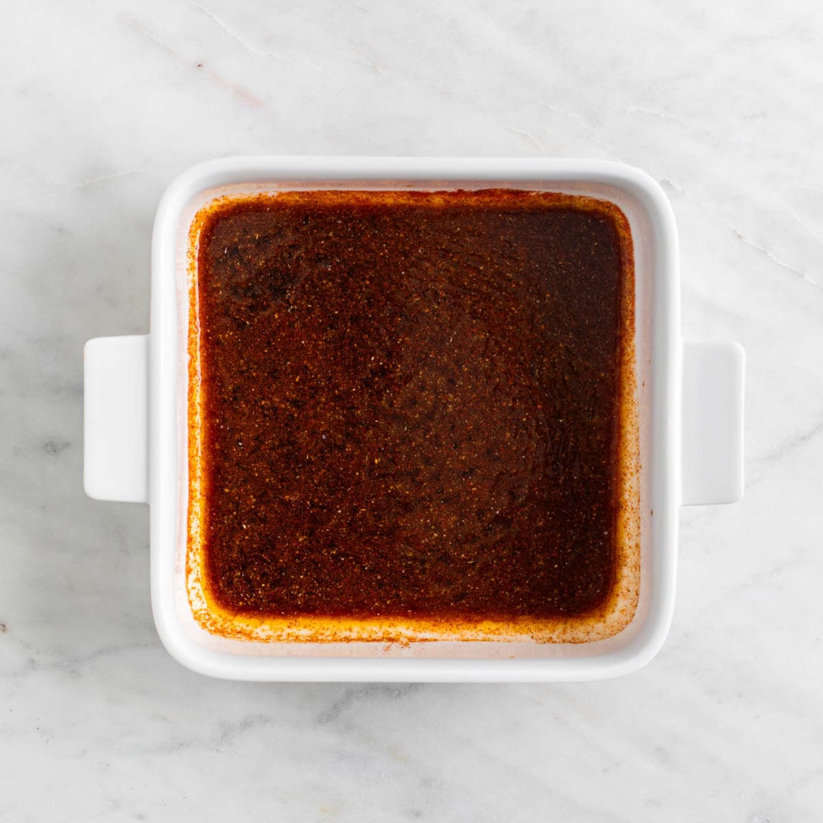 Marinade in a baking dish.
