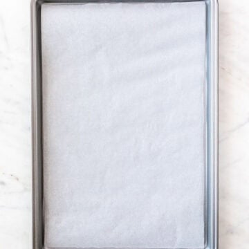 A baking sheet lined with parchment paper.
