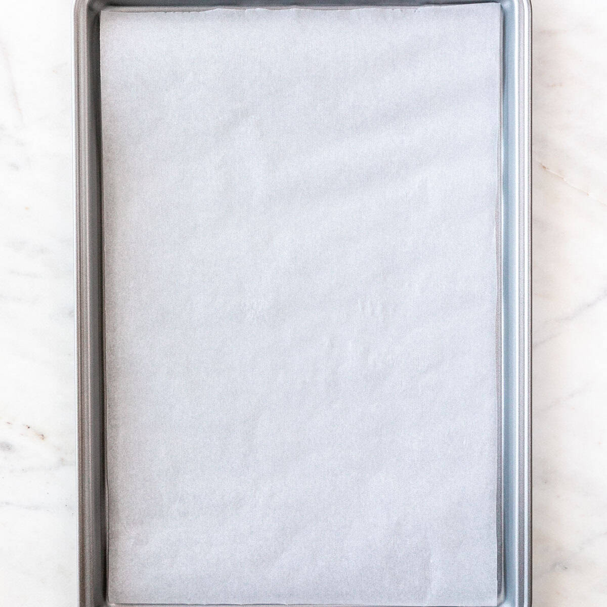 A baking sheet lined with parchment paper.