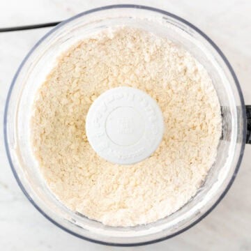 Cold butter cut into flour until the dough resembles coarse crumbs.