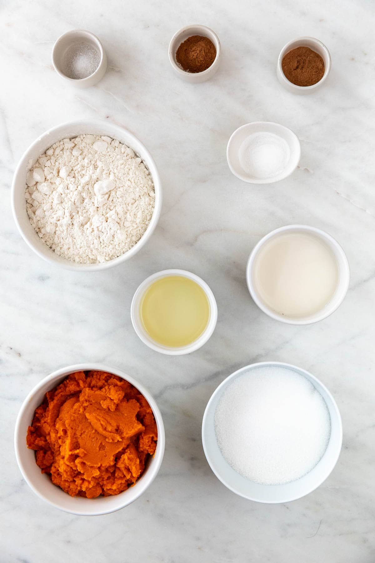 Ingredients for making vegan pumpkin muffins.
