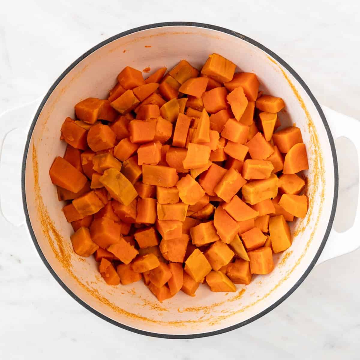 Boiled sweet potatoes in a pot.