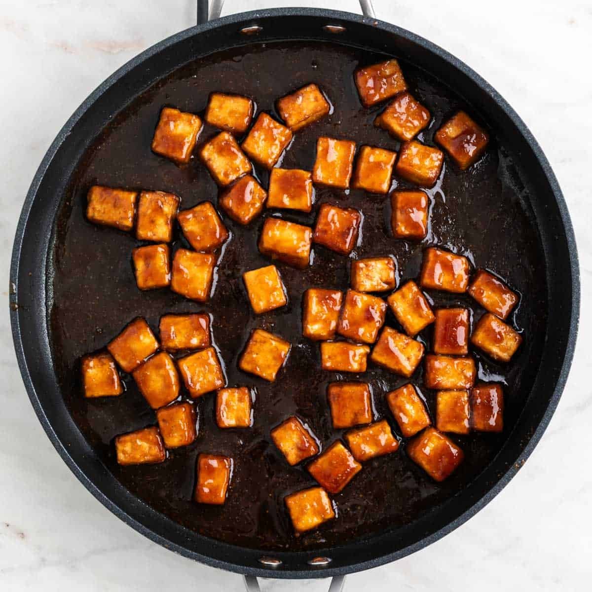 Teriyaki tofu in a pan.