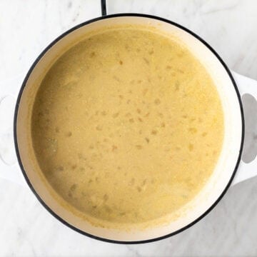 Vegan potato soup cooked in a pot.